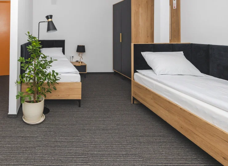 Pojedyncze, komfortowe łóżka w pokojach triple są gwarancją odpoczynku