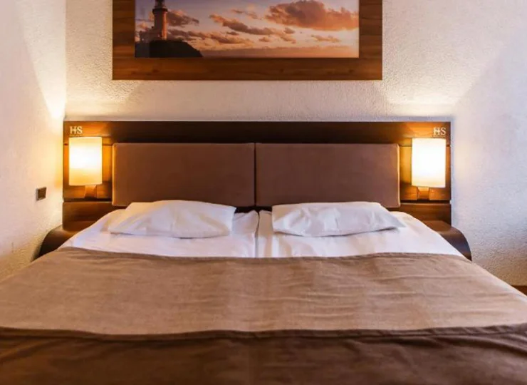 Goście mogą wybrać między łóżkiem małżeńskim i łóżkami pojedynczymi