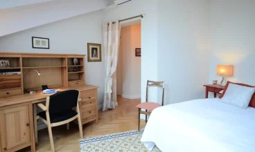 Przyjemnie urządzona sypialnia w apartamencie Deluxe