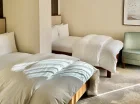 Pokoje executive twin posiadają dwa odrębne łóżka queen-size