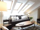 Apartament 2-os. Deluxe Loft ma okna dachowe