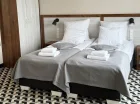 Pokoje 3-osobowe posiadają pojedyncze łóżka