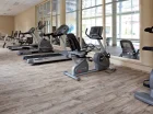 Sala fitness została wyposażona w różnorodny nowoczesny sprzęt