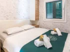Comfort plus villa - sypialnia z podwójnym łóżkiem