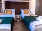 Sypialnia z 2 łóżkami w Eco luxury camping villa