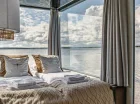  HT Houseboats to domki w Mielnie z panoramicznym widokiem na jezioro Jamno