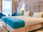 Nowoczesny hotel w standardzie Premium oferuje przestronne i wygodne pokoje