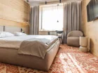 Nowoczesne pokoje klasy premium zapewniają wysoki komfort pobytu