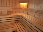 Kompleks posiada kameralną strefę wellness z sauną