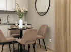 W każdym apartamencie jest pokój dzienny z aneksem kuchennym