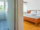Pokój rodzinny standard 2+2 składa się z 2 sypialni i wspólnej łazienki