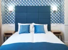 Część sypialną utrzymano w odcieniach niebieskiego