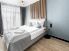 Apartament Family Suite posiada dwie odrębne sypialnie