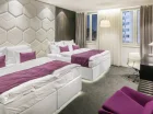 4-osobowy pokój deluxe pozwala na wspólny rodzinny pobyt w Czechach
