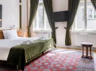 W Chopin Boutique B&B królują naturalne, drewniane podłogi i meble z epoki