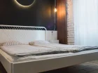 W pokojach znajdują się łóżka podwójne oraz pojedyncze