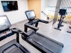 Resort Apartamenty Klifowa Rewal mają też salę fitness ze sprzętem do ćwiczeń