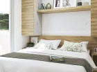 Sypialnia domku premium z podwójnym łóżkiem (wnętrza są klimatyzowane)