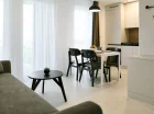 Każdy apartament ma wielofunkcyjny pokój dzienny z kuchnią i kanapą