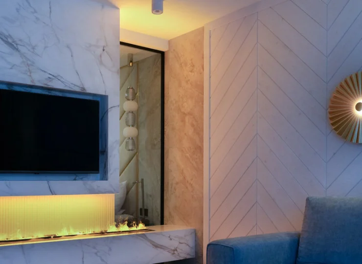 W apartamencie A20 jest kominek w salonie