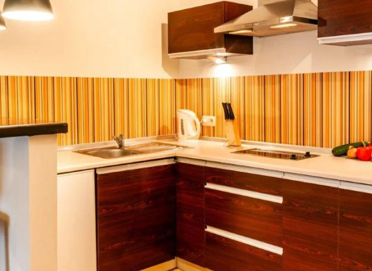 Każdy apartament ma wyposażony aneks kuchenny