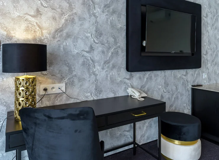 W wyposażeniu m.in. TV z płaskim ekranem i miejsce do pracy