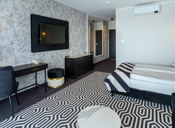 Każdy pokój posiada wygodne łóżko i dostęp do Wi-Fi