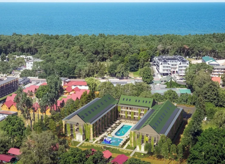 Nowoczesny apartamentowiec z zewnętrznym basenem mieści się 400 m od morza