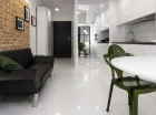 Pokój dzienny i aneks kuchenny Apartamentu superior 2+2 z tarasem