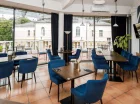 Hotelowa restauracja oferuje widok na serce uzdrowiska