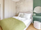 Sypialnia w apartamencie 2-pokojowym