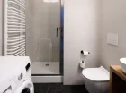 Dużą zaletą łazienek w Miodova Inspire Residence jest pralka