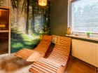 Przy saunie jest wypoczywalnia