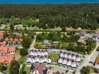 Kompleks Domki Fantazja&Spa Dębki mieści się 800 metrów od plaży