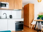 W każdym apartamencie jest aneks kuchenny