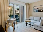 Apartament tego typu ma salon z aneksem