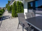 Goście apartamentów mają dostęp do tarasów i stanowisk do grillowania