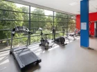 Na szóstym piętrze przygotowano salę fitness z widokiem na park i deptak