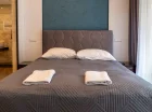 Każdy pokój posiada TV, wifi, czajnik, własny balkon i łazienkę