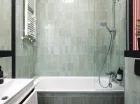 W łazience Deluxe Suite jest wanna