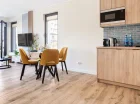 W każdym apartamencie jest aneks kuchenny
