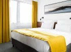 Apartament deluxe posiada część dzienną oraz sypialnianą