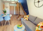 Pokój dzienny 2-poziomowowego apartamentu D2