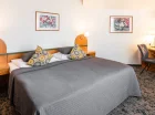 Sypialnia pokoju rodzinnego 2+2 suite