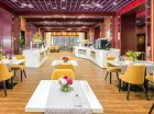Goście hotelowi mają dostęp do eleganckiej restauracji