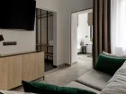 Sypialnia w pokoju deluxe grand