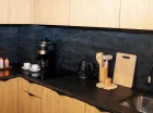 Apartamenty mają aneksy kuchenne ze zmywarką