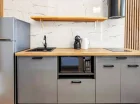 Aneks kuchenny w apartamencie 2+2 z sauną