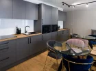 Apartamenty wyposażono m.in. w szlafroki, żelazko i deskę do prasowania