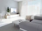 Jest tu łóżko, sofa, aneks kuchenny, stół, łazienka, balkon lub taras